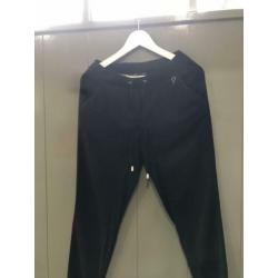 Rinascimento broek maat S valt als 36/38 zwart