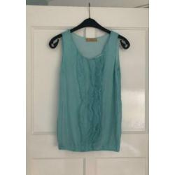 Turquoise topje van The Sting
