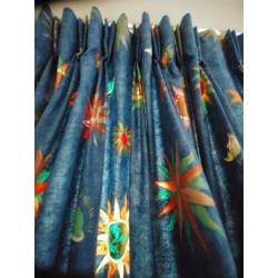 Gevoerde gordijnen blauw met zon maan sterren