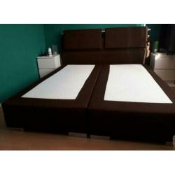 **Gratis** 2 pers. Boxspring met pocketvering matras.
