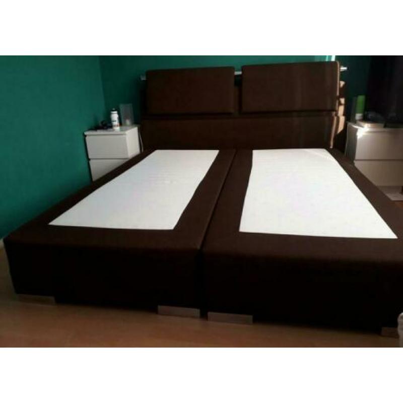 **Gratis** 2 pers. Boxspring met pocketvering matras.