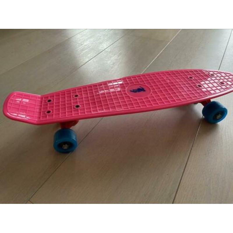 Roze skateboard zo goed als nieuw