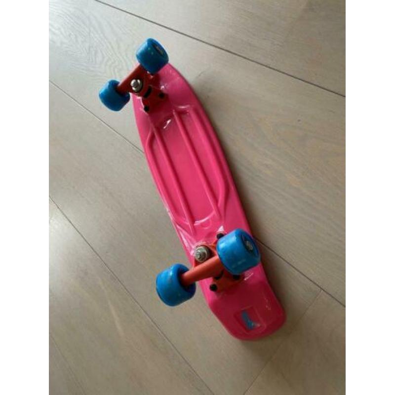 Roze skateboard zo goed als nieuw