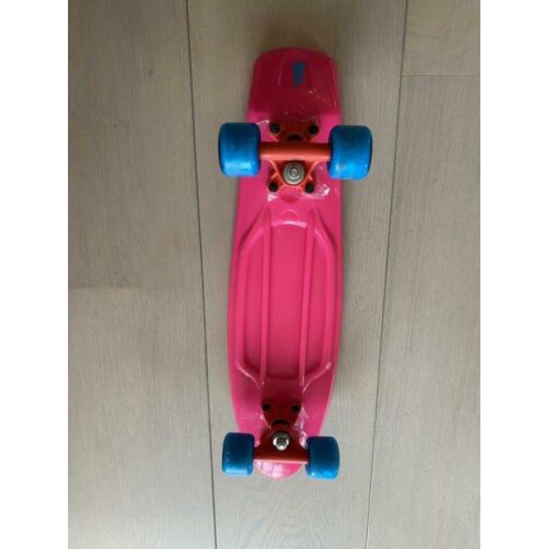 Roze skateboard zo goed als nieuw