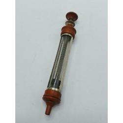 Antiek medische tongue depressor en spuit