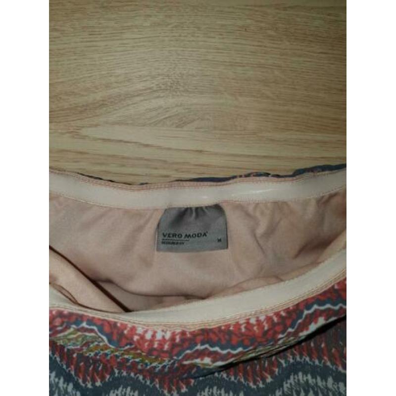 Lange strapless jurk