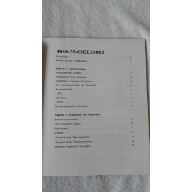 Uit 1987/8 Duitse en Franse Atari handleiding hard disk